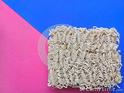 Top view of instant noodles with colored background Stock Photo