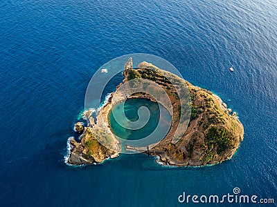 Top view of Islet of Vila Franca do Campo is formed by the crater of an old underwater volcano near San Miguel island, Azores, Por Stock Photo