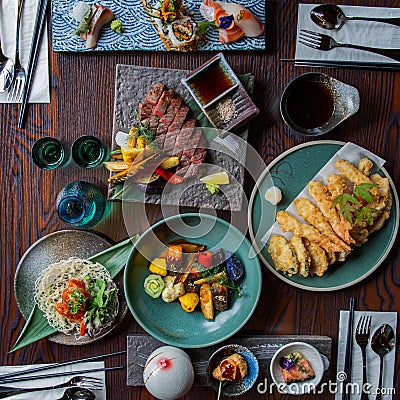 Top view of Kaiseki sushi platter combo set on the serving board in the fine dining Japanese restaurant Stock Photo