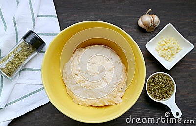 Top View of Kneaded Dough with Ingredients for Baking Focaccia Bread Stock Photo