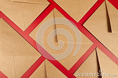 Top view of kraft envelopes on red background. Stock Photo