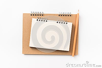 Top view of kraft spiral notebook isolated on background for mockup Stock Photo