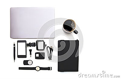 Top view laptop, cup coffee,watch digital camera,pencil,book and white blank screen mock up Copy space for your text Stock Photo