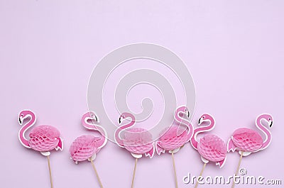 Top view of line of decorative pink flamingos.Empty space Stock Photo