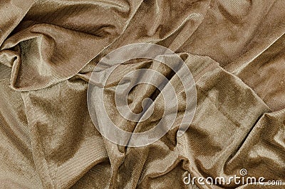 Top view messy gold bed sheets wrinkled fabric texture Stock Photo