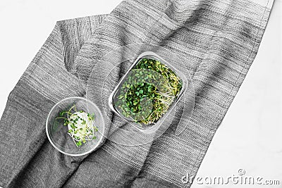 Top view of microgreens on white marble table. Healthy superfood concept Stock Photo