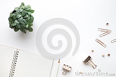 Top view of Mockup notepad and accessories in white background. Stock Photo