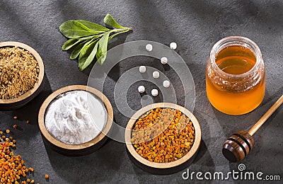 Top view of natural sweeteners - Sugar, stevia leaves, pollen and honey Stock Photo