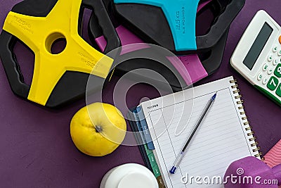 top view of new athletic equipment and notebook with pen. Stock Photo