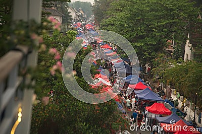 Top view of Night market in twilight time is popular tourist attraction sell a lot of souvenirs and handicrafts. Editorial Stock Photo