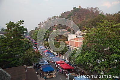 Top view of Night market in twilight time is popular tourist attraction sell a lot of souvenirs and handicrafts. Editorial Stock Photo