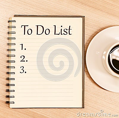 Top view notebook write message To Do List and number list with coffee cup on table Stock Photo