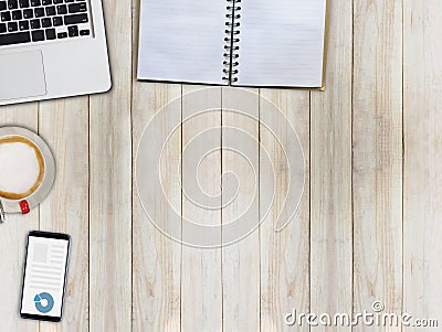 Top view office desk table with laptop, coffee, book and mobile Stock Photo