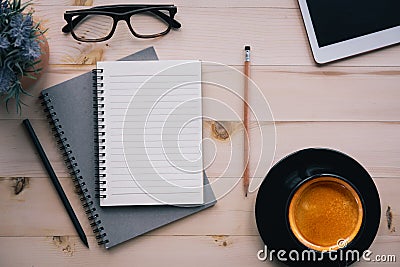 Top view office table with notebook and notepad,espresso coffee. with copy space for text or design Stock Photo