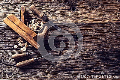 Top of view old planer and other vintage carpenter tools in a carpentry workshop Stock Photo