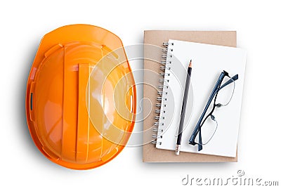 Top view with orange safety engineer helmet and blank notebook Stock Photo