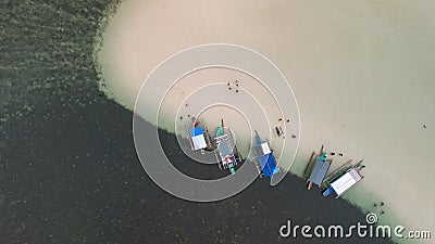 Top view of outriggers docked on the beach sand Stock Photo