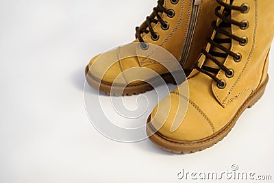 top view of a pair of yellow leather child shoes Stock Photo