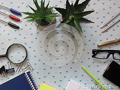 Top view. Patterned worktable. Work and visual problems. Office stuff. Stock Photo