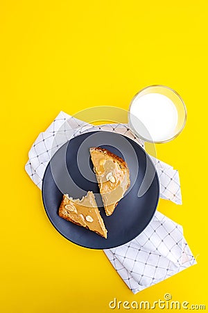 Top view. Peanut butter toasts on plate. Stock Photo