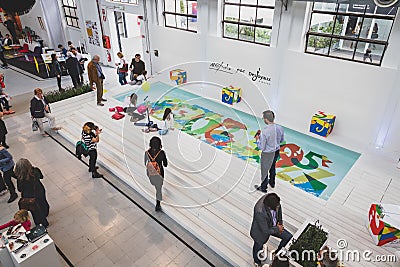 Top view of people and exhibitors at Fuorisalone during Milan De Editorial Stock Photo