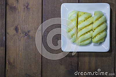 Top view pineapple chucks in a bowl Stock Photo