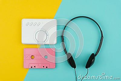 Top view of a pink audio cassette tape with a white portable cassette player Stock Photo