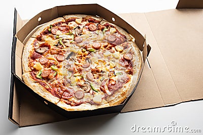 Top view pizza on brown box.Simple food and eating Stock Photo