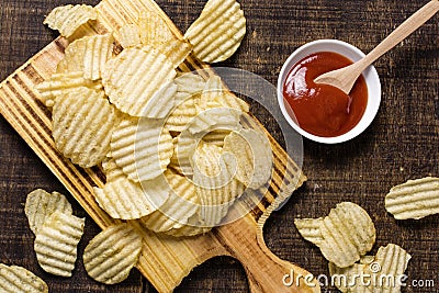 top view potato chips with ketchup. High quality photo Stock Photo