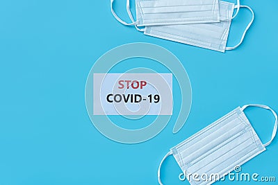 Top view of protective mask on blue background. Health care concept Stock Photo