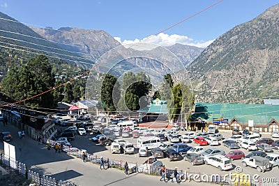 Top view of Ramleela Ground Parking lot at an altitude of 2670 m, surrounded by panoramic Kinner Kailash mountain range. Reckong Editorial Stock Photo