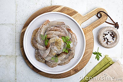 Top view of raw fresh headless shrimp tails or prawns Stock Photo