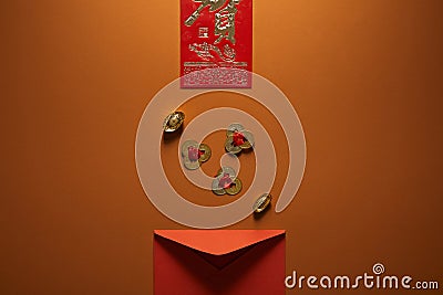 Top view of red envelope, golden chinese decorations and hieroglyph Stock Photo