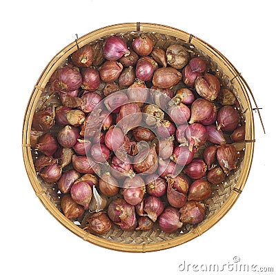 Top view of red onion in weaven basket which ventilated for keep prolong Stock Photo