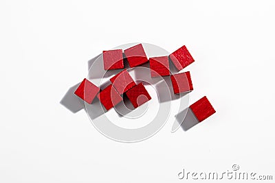 Top View of Red Wooden Game Cubes on White Background Stock Photo