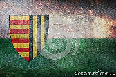 Top view of retro flag Bree, Belgium with grunge texture. Belgian patriot and travel concept. no flagpole. Plane design, layout. Stock Photo
