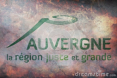 Top view of retroflag former Region of Auvergne, France with grunge texture. French patriot and travel concept. no flagpole. Stock Photo