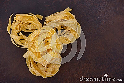 Top view rolled fettuccine pasta Stock Photo