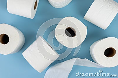 Top view of rolls of toilet paper on blue background Stock Photo