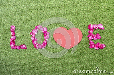 Top view rose petals in a row of love with mock up red heart. Valentine day concept Stock Photo