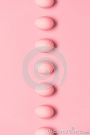 Top view of row of painted pink eggs for easter Stock Photo