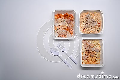 Several frozen meal on white background with copy space for text. Stock Photo