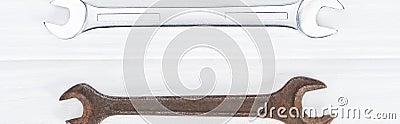 Top view of shiny and rustle on white wooden background, panoramic shot Stock Photo