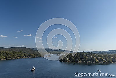 Top view of the ship, surrounded by boats, floats along the blue Stock Photo