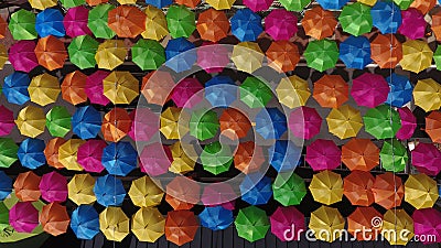 Top view shot of colorful bright soaring umbrellas Editorial Stock Photo
