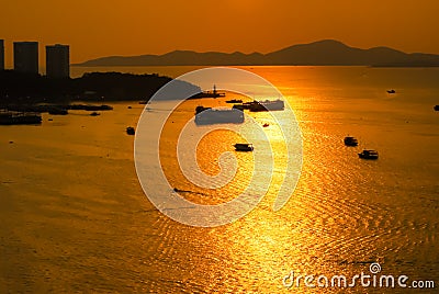 Top view of silhouette boats on golden sea Koh Chang Thailand Stock Photo