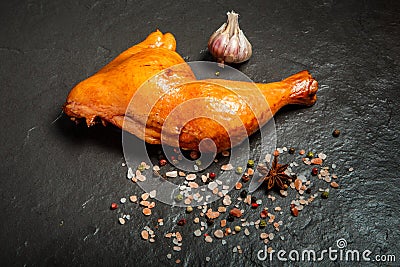 Top view single smoked chicken leg with garlic and spices Stock Photo