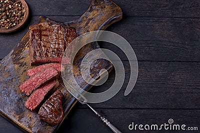 Top view sliced steak on cutting board Stock Photo