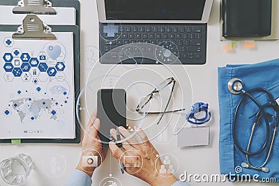 top view of smart medical doctor working with mobile phone and l Stock Photo