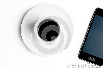 Top of view of smartphone and cup of coffee Stock Photo